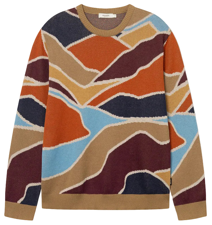 A crewneck sweater featuring a retro, abstract wavy pattern in orange, tan, navy, burgundy, and light blue, with solid tan ribbed trim on the collar, cuffs, and hem.