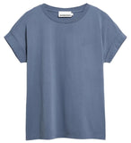 A dusty blue short-sleeve crewneck t-shirt with a small embroidered polo player logo on the left chest, displayed flat against a white background.