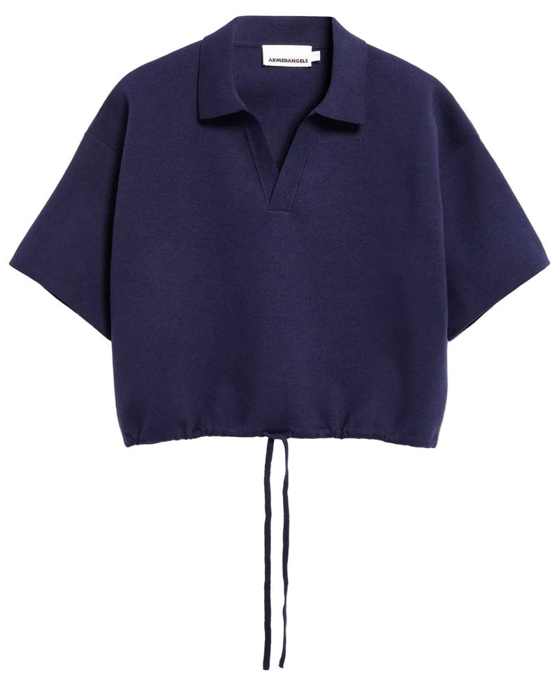 A cropped short-sleeve knit polo shirt in deep navy blue, featuring a collar, a split V-neckline, and a drawstring tie at the hem, displayed against a clean off-white background.