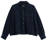 A dark navy blue cropped denim shirt jacket with a button-down front, pointed collar, and a chest pocket, displayed against a white background.