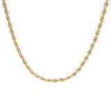 Gold chain necklace on a white background