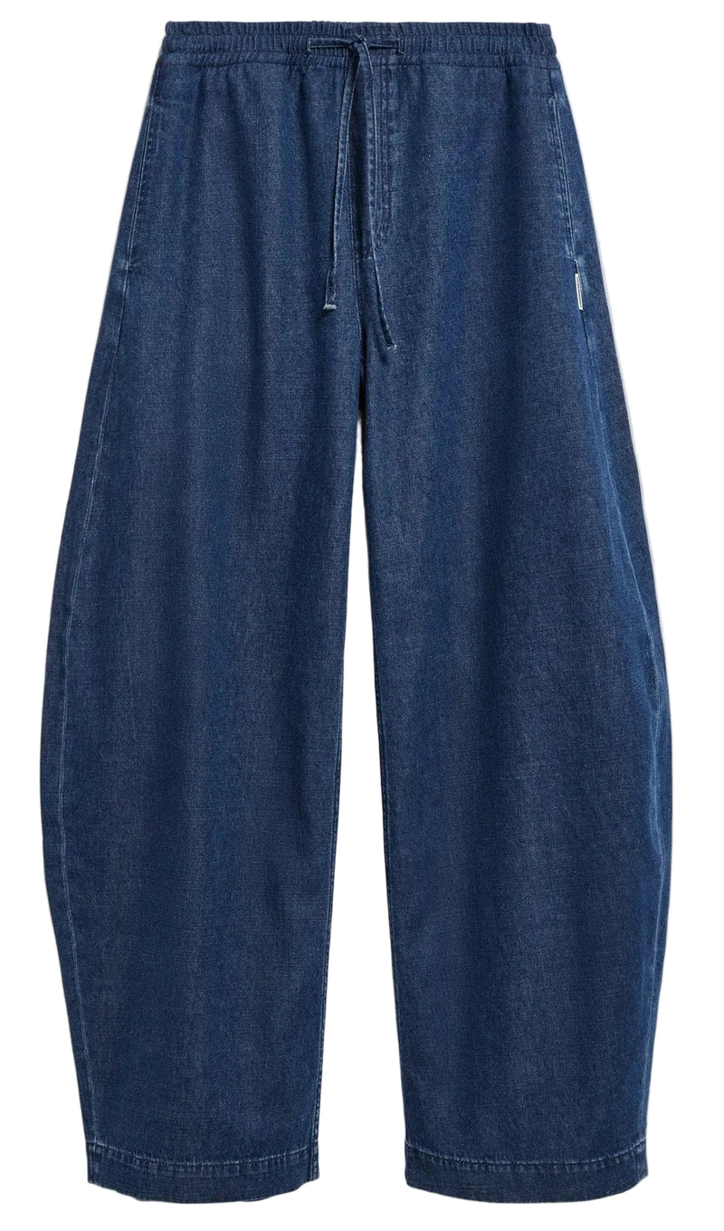 A pair of dark blue denim pants with an elastic waistband and drawstring, displayed flat against a light gray background.