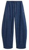 A pair of dark blue denim pants with an elastic waistband and drawstring, displayed flat against a light gray background.