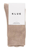 Folded beige sock with a KLUE label on a white background