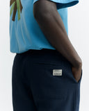 THINKING MU Light travel pants navy men